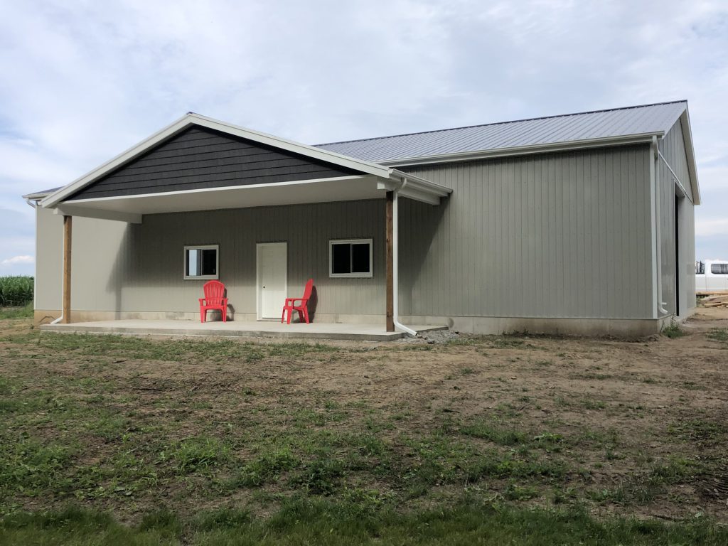 Front view of completed shop building
