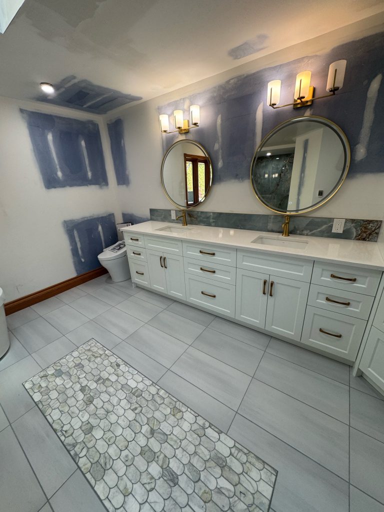 Bathroom vanity and new tile floor after renovation