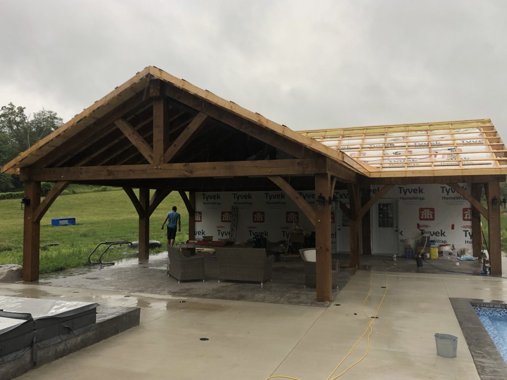 Timber roof and pool house structure during construction