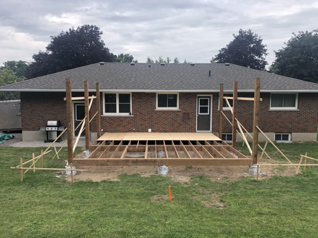 Covered deck framing and stairs during construction