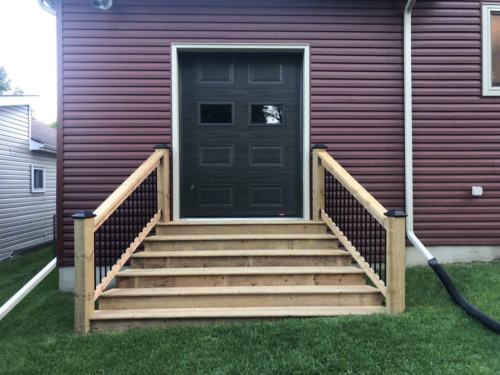 Finished exterior steps and rear doorway
